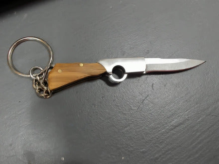 Brown gunshaped keychain knife