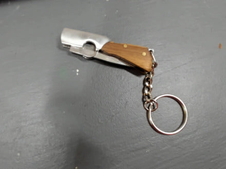 Brown gunshaped keychain knife