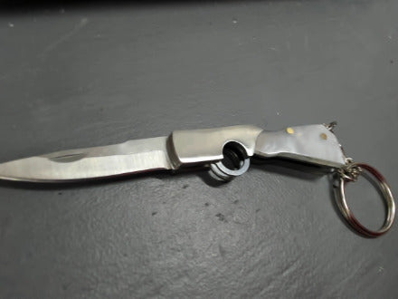 Silver gunshaped keychain knife