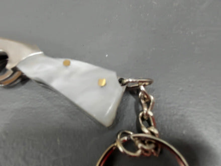 Silver gunshaped keychain knife